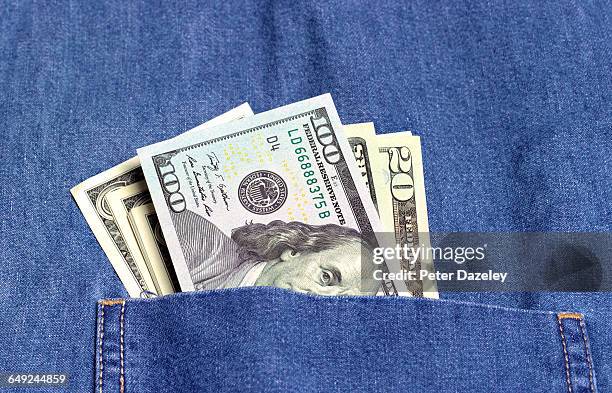 bribe in pocket - tax evasion stock pictures, royalty-free photos & images