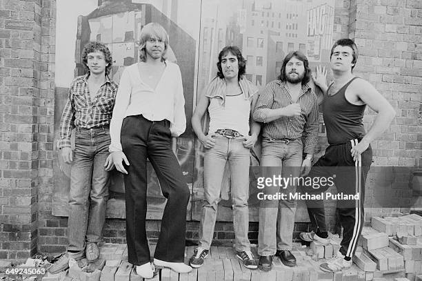 English composer and keyboard player Rick Wakeman and his band, August 1980. Left to right: guitarist Tim Stone, Wakeman, drummer Tony Fernandez,...
