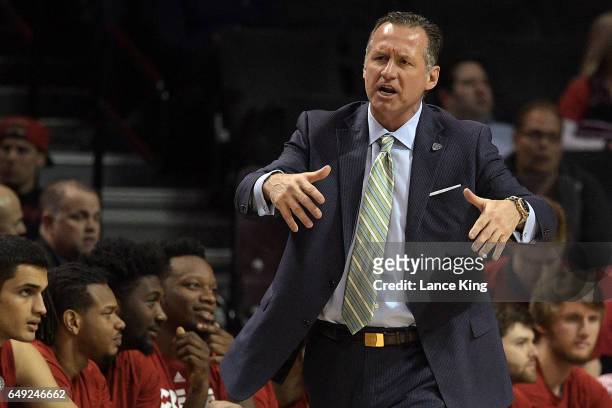 Head coach Mark Gottfried of the North Carolina State Wolfpack reacts during their game against the Clemson Tigers at Barclays Center during the ACC...