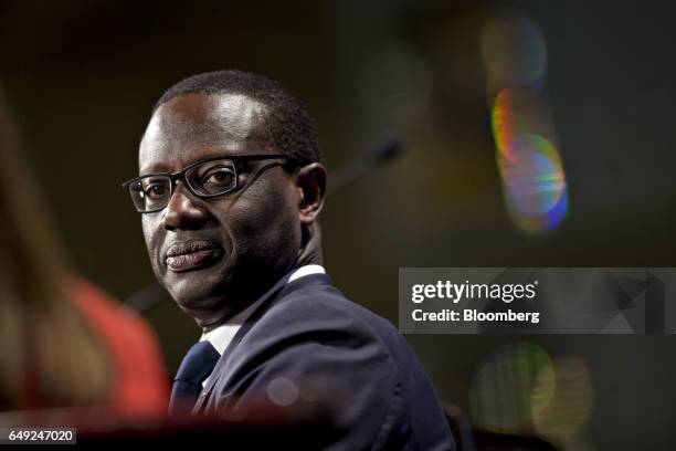 Tidjane Thiam, chief executive officer of Credit Suisse Group AG, listens to a question during a discussion at the National Association for Business...