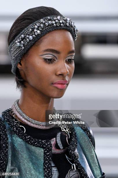 Tami Williams, beauty detail, walks the runway during the Chanel show as part of the Paris Fashion Week Womenswear Fall/Winter 2017/2018 on March 7,...
