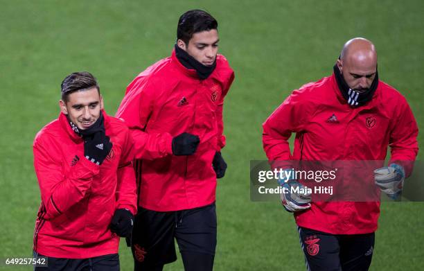 Eduardo Salvio , Raul Jimenez and Paulo Lopes of Benfica warm up during the training prior the UEFA Champions League Round of 16 second leg match...