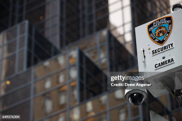 New York City Police Department security camera hangs atop a light pole across the street from Trump Tower, March 7, 2017 in New York City. In a...