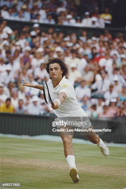 French tennis player Henri Leconte pictured in action competing to reach the semifinals of the Men's Singles tournament at the Wimbledon Lawn Tennis...