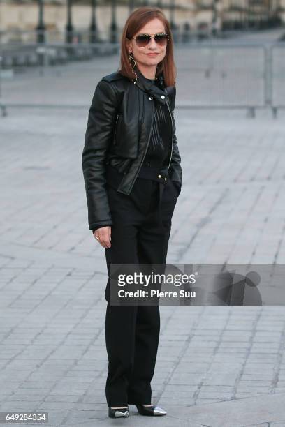 Isabelle Huppert arrives at the Louis Vuitton show as part of the Paris Fashion Week Womenswear Fall/Winter 2017/2018 on March 7, 2017 in Paris,...