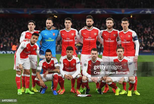 The Arsenal team line up prior to the UEFA Champions League Round of 16 second leg match between Arsenal FC and FC Bayern Muenchen at Emirates...