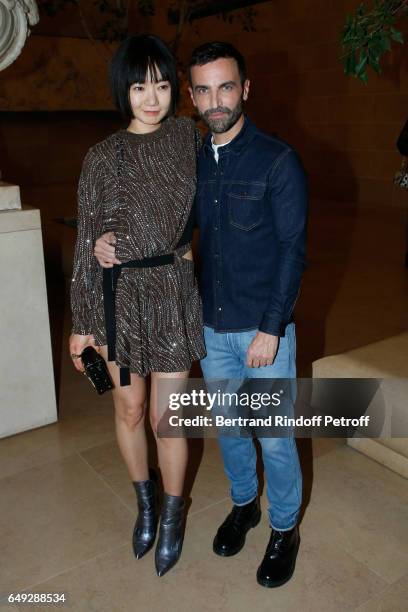 Doona Bae and Stylist Nicolas Ghesquiere pose after the Louis Vuitton show as part of the Paris Fashion Week Womenswear Fall/Winter 2017/2018 on...