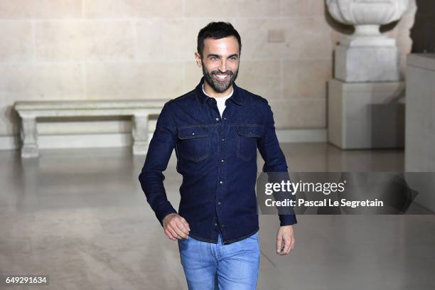 Nicolas Ghesquiere walks the runway during the Louis Vuitton show as part of the Paris Fashion Week Womenswear Fall/Winter 2017/2018 on March 7, 2017...