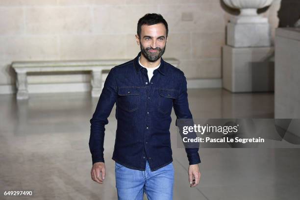 Nicolas Ghesquiere walks the runway during the Louis Vuitton show as part of the Paris Fashion Week Womenswear Fall/Winter 2017/2018 on March 7, 2017...