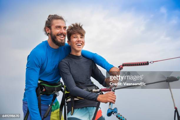 happy with the wind - kite surfing stock pictures, royalty-free photos & images