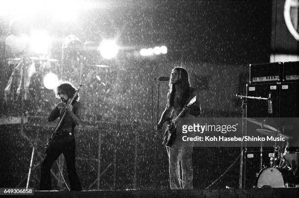 Grand Funk Railroad playing in heavy rain at Korakuen stadium, June 17th, 1971.