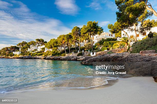 cala d'or at sunrise - ibiza strand stock pictures, royalty-free photos & images