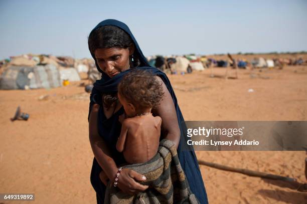 Malian refugees are seen at the Mbera refugee camp, Mbera, Mauritania, July 17, 2012. Malian refugees are fleeing violence in their country, in fear...