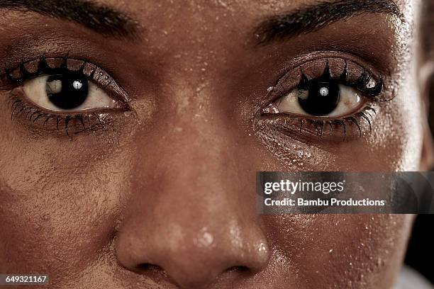 close up of a woman with wet face - sweating stock pictures, royalty-free photos & images