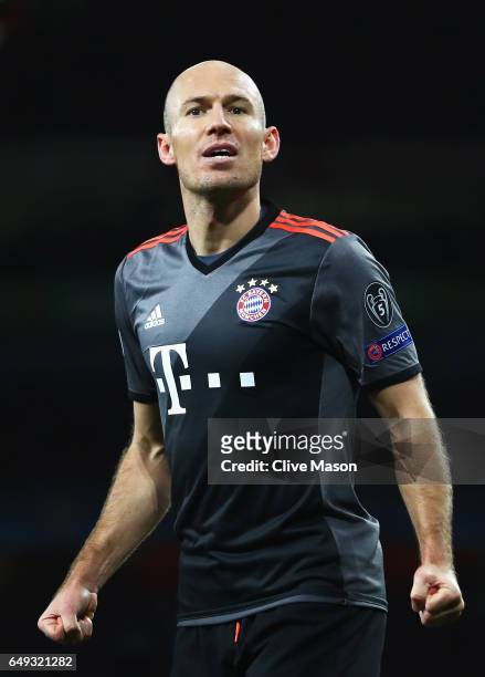 Arjen Robben of Bayern Muenchen celebrates as he scores their second goal during the UEFA Champions League Round of 16 second leg match between...