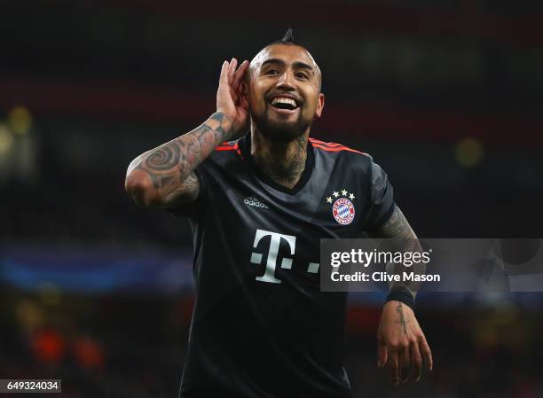 Arturo Vidal of Bayern Muenchen celebrates as he scores their fourth goal during the UEFA Champions League Round of 16 second leg match between...