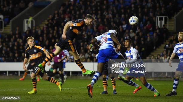 Newcastle striker Daryl Murphy gets a header in on goal during the Sky Bet Championship match between Reading and Newcastle United at Madejski...