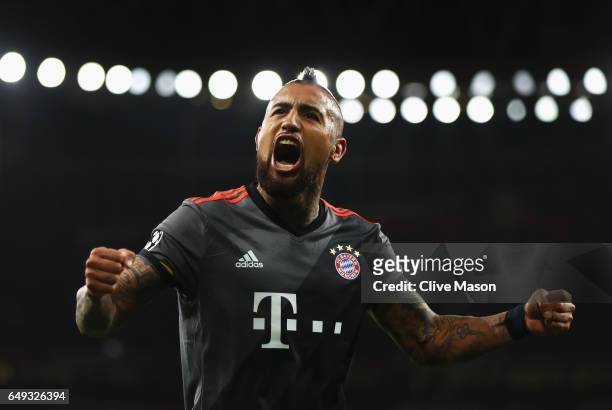 Arturo Vidal of Bayern Muenchen celebrates as he scores their fourth goal during the UEFA Champions League Round of 16 second leg match between...