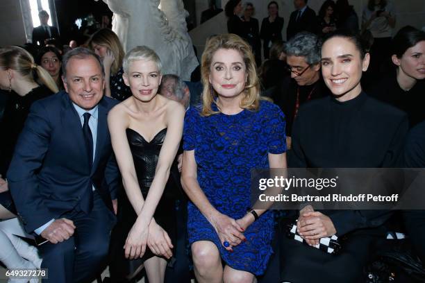 Chief Executive Officer of Louis Vuitton, Michael Burke, Michelle Williams, Catherine Deneuve and Jennifer Connelly attend the Louis Vuitton show as...