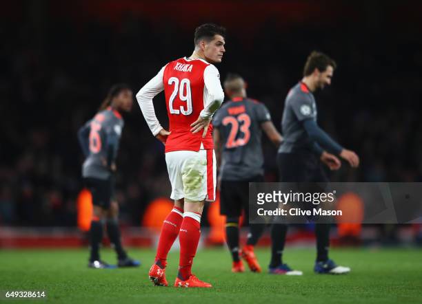 Granit Xhaka of Arsenal looks dejected in defeat after the UEFA Champions League Round of 16 second leg match between Arsenal FC and FC Bayern...