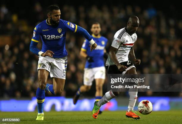 Sone Aluko of Fulham is chased down by Kyle Bartley of Leeds United during the Sky Bet Championship match between Fulham and Leeds United at Craven...