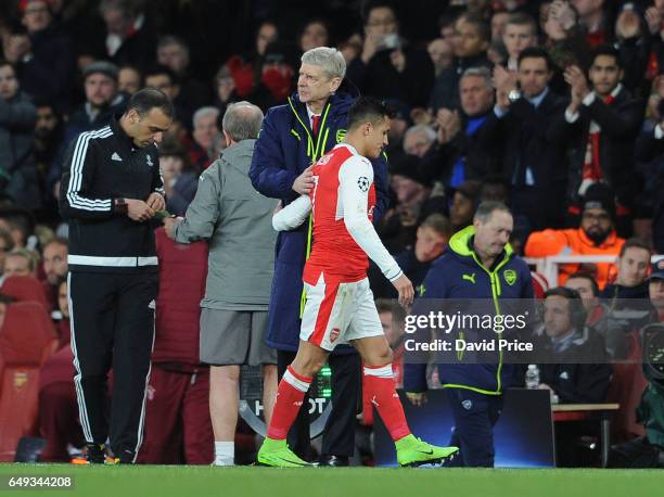 Arsene Wenger the Arsenal Manager and Alexis Sanchez of Arsenal during the UEFA Champions League Round of 16 second leg match between Arsenal FC and...