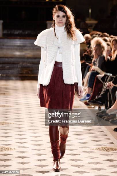 Model Alisar Ailabouni walks the runway during the Nobi Talai show as part of the Paris Fashion Week Womenswear Fall/Winter 2017/2018 on March 7,...