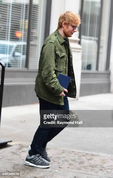 Singer Ed Sheeran is seen outside Taylor Swift Home in Soho on March 7, 2017 in New York City.