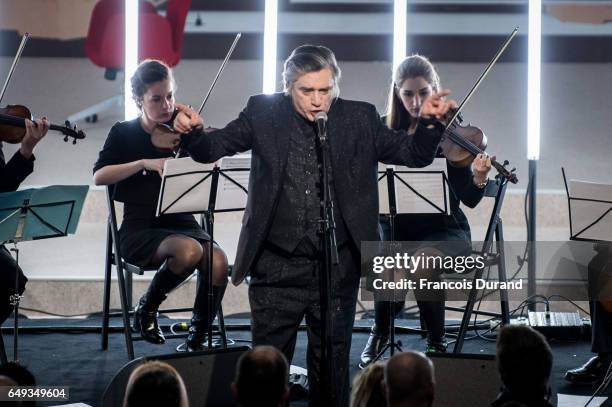 Musicien Blixa Bargeld performs during a Yang LI event At Palais de Tokyo as part of the Paris Fashion Week Womenswear Fall/Winter 2017/2018 on March...