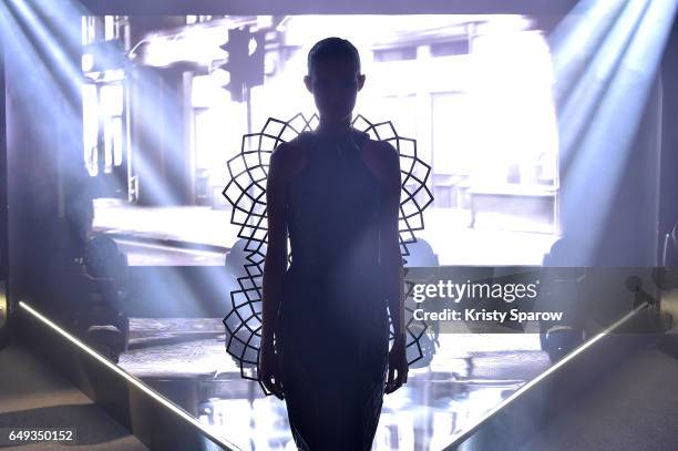 Model poses during the Ghost in the Shell and Tumblr partner to explore the future of technology and fashion with a live exhibition in Paris on March...