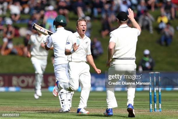 Neil Wagner of New Zealand celebrates the dismissal of JP Duminy of South Africa during day one of the First Test match between New Zealand and South...