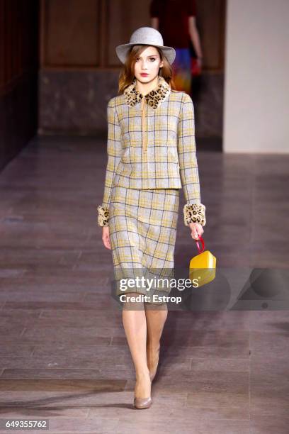 Model walks the runway during the Agnes B designed by Agnes Troublé show as part of the Paris Fashion Week Womenswear Fall/Winter 2017/2018 on March...