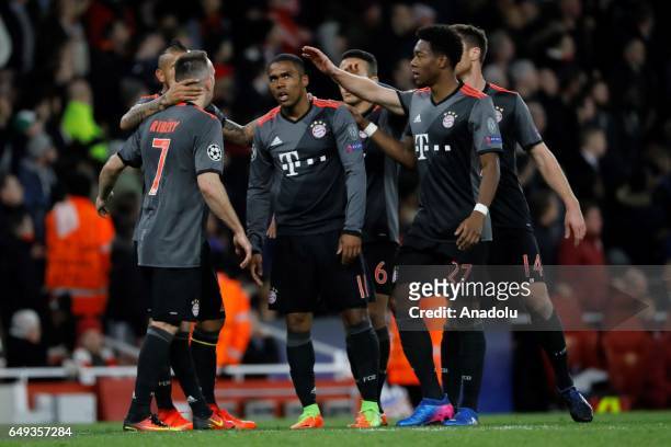 Bayern Munich players celebrate after a goal during the UEFA Champions League match between Arsenal FC and Bayern Munich at Emirates Stadium on March...