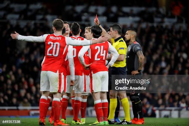 Arsenals Laurent Koscielny is given red card during the UEFA Champions League match between Arsenal FC and Bayern Munich at Emirates Stadium on March...