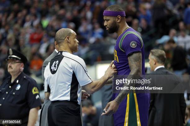 DeMarcus Cousins of the New Orleans Pelicans talks with referee Dan Crawford at American Airlines Center on February 25, 2017 in Dallas, Texas. NOTE...