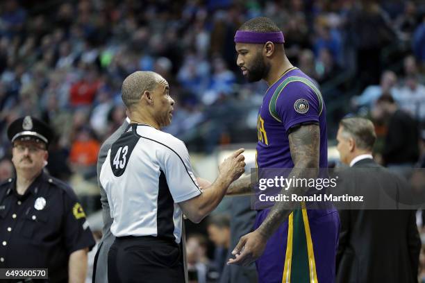 DeMarcus Cousins of the New Orleans Pelicans talks with referee Dan Crawford at American Airlines Center on February 25, 2017 in Dallas, Texas. NOTE...