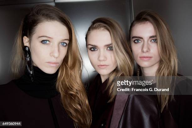 Models pose backstage before the Nobi Talai Paris show as part of the Paris Fashion Week Womenswear Fall/Winter 2017/2018 on March 7, 2017 in Paris,...