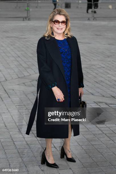 Actress Catherie Deneuve attends the Louis Vuitton show as part of the Paris Fashion Week Womenswear Fall/Winter 2017/2018 on March 7, 2017 in Paris,...