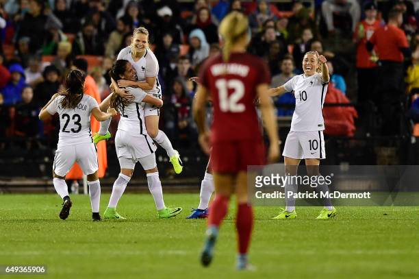 Eugenie Le Sommer of France celebrates with her teammates after scoring a goal against the United States of America in the first half during the 2017...