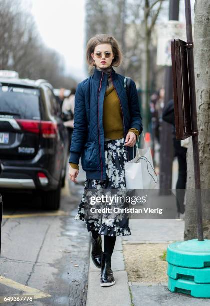 Model Lindsey Wixson outside Chanel on March 7, 2017 in Paris, France.