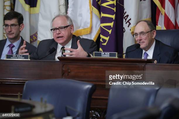 House Veterans Affairs Committee ranking member Rep. Tim Walz 2nd L) and Chairman Phil Roe listen to testimony during a hearing about ongoing reforms...
