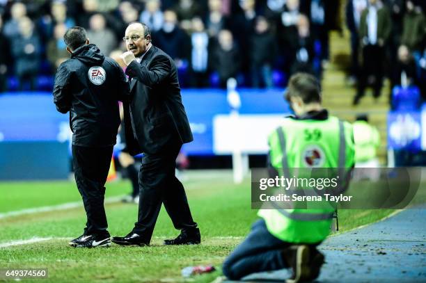 Newcastle Unitedâs Manager Rafael Benitez speaks to Fourth Official Keith Stroud during the Sky Bet Championship Match between Reading and Newcastle...