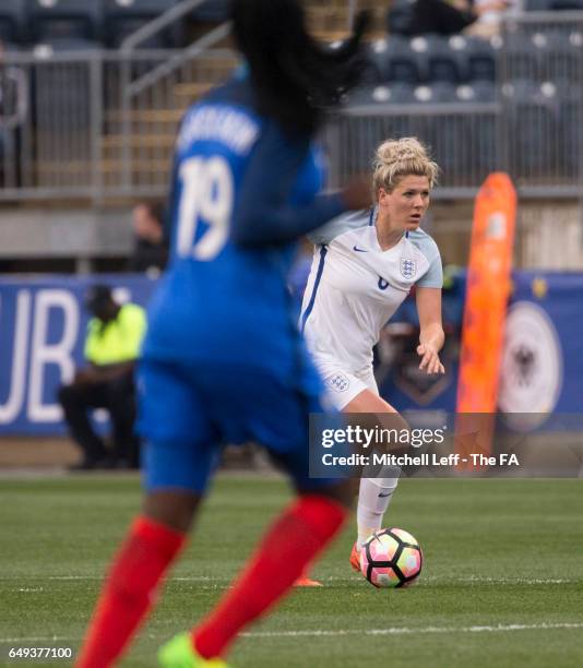 Millie Bright of England controls the ball against Griedge M'bock of France during the SheBelieves Cup at Talen Energy Stadium on March 1, 2017 in...