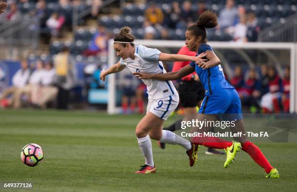 Jodie Taylor of England fights for control of the ball against Laura Georges of France during the SheBelieves Cup at Talen Energy Stadium on March 1,...