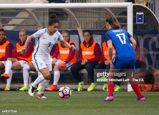 Demi Stokes of England controls the ball against Gaëtane Thiney of France during the SheBelieves Cup at Talen Energy Stadium on March 1, 2017 in...