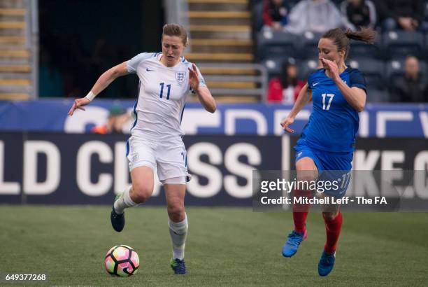 Ellen White of England controls the ball against Gaëtane Thiney of France during the SheBelieves Cup at Talen Energy Stadium on March 1, 2017 in...