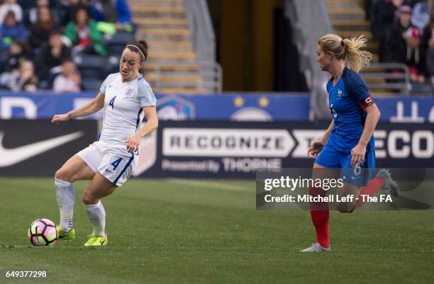 Lucy Bronze of England controls the ball against Amandine Henry of France during the SheBelieves Cup at Talen Energy Stadium on March 1, 2017 in...