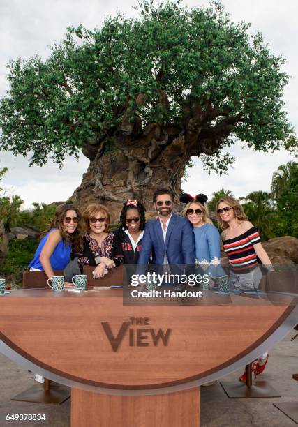 In this handout photo provided by Disney Resorts, hosts Sunny Hostin, Joy Behar, Whoopi Goldberg, guest John Stamos, Sara Haines and Jedediah Bila...