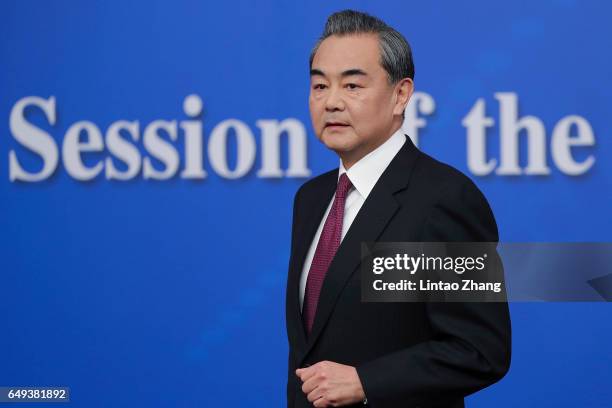 China's foreign minister Wang Yi attends a press conference at Media Center on March 8, 2017 in Beijing, China. In May 2017, Beijing held the Belt...