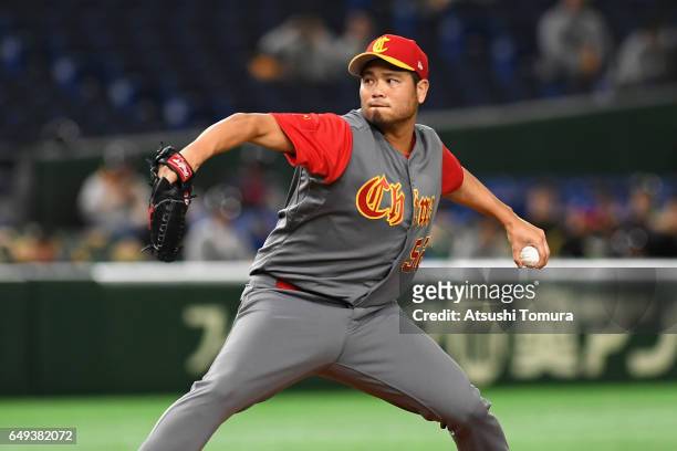 Starting Pitcher Bruce Chen of China throws in the bottom of the first inning during the World Baseball Classic Pool B Game Two between China and...